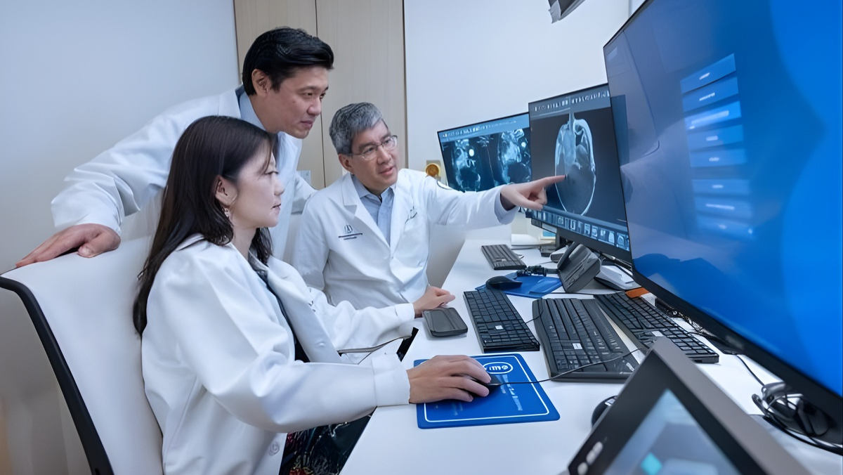 Clinical researchers using AI software to analyse medical imaging and patient data